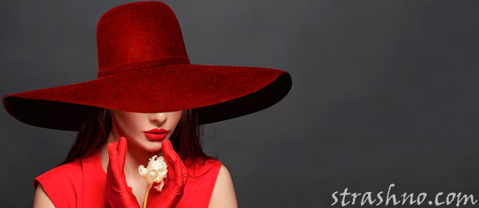 женщина в красной шляпе